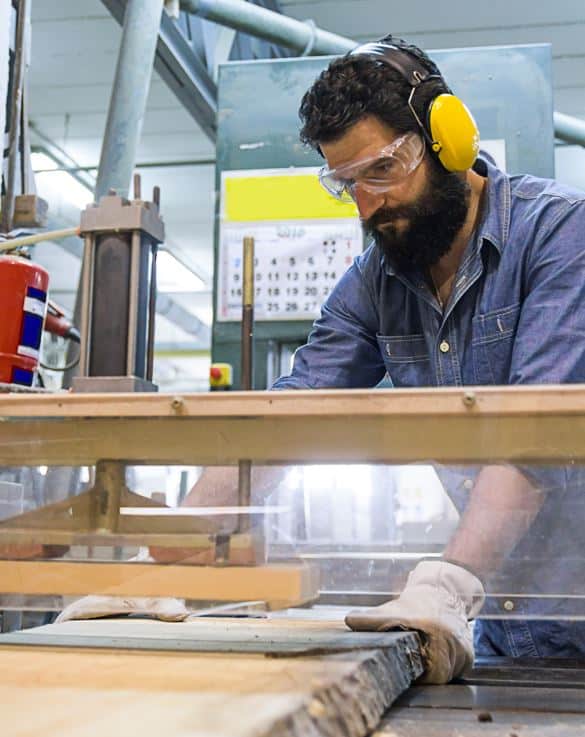 Person Working In Shop Wearing Hearing Protection